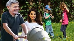 Amal enjoys a relaxing stroll with George and their newborn daughter Annie &Twins, Alexander & Ella