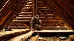 A MAN ALONE BUILDS A LARGE LOG HOUSE IN THE WILD FOREST. THE WOODEN FLOOR IS READY!