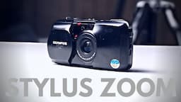 How to USE an OLYMPUS Infinity Stylus Zoom DLX 35mm Film Camera - BATTERY Replacement & LOAD Film