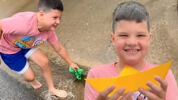 RAINY DAY FUN for Kids! How to Make a Paper Boat to Play with in the Rain Crafts for Kids w/ Caleb!