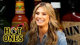 Heidi Klum Strikes a Pose While Eating Spicy Wings | Hot Ones