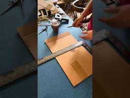 Making a  shipping box from saved corrugated board.