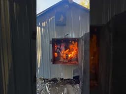 Making cherry charcoal with my outdoor wood boiler.