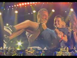 Daniël (10) on stage with Bruce Springsteen