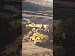 Haul Truck Stuck Excavator Pulls It Out. North Dakota