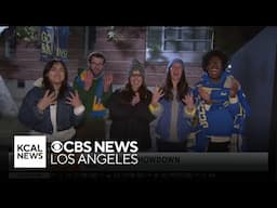 UCLA students guard the bronze Bruin Bear ahead of crosstown rival game