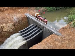 Construction of a powerful 4-gate discharge dam