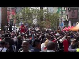 Activist Morara Kebaso addresses a throng of supporters in the heart of Nairobi CBD.