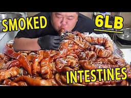 Brother Monkey eats 6 pounds of smoked pig intestines  one bite at a time  it’s a satisfying meal (