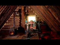 MAN SURVIVES COLD NIGHT IN BIG WARM LOG HOUSE. BUILD A PORCH FROM LOGS.