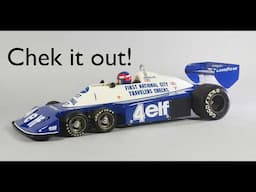 Tyrrell P34 refitting work on the original vintage model.