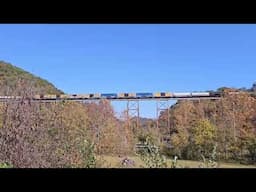 CSX manifest on the Copper Creek trestle with a special appearance of the NS Southern Heritage 8099