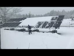 Removing snow from my solar array panels