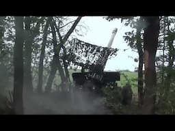 Giatsint-B howitzer crews launch firing attack