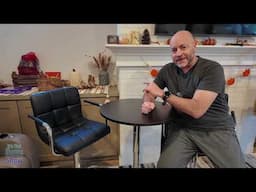 Black and chrome adjustable bar stools with arm rest