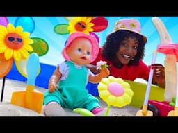 The toy flower is crying! Baby Annabell doll pretends to play a gardener. Baby dolls videos for kids