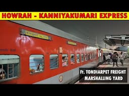 12665 Howrah - Kanniyakumari Express moving past the massive TONDIARPET FREIGHT MARSHALLING YARD