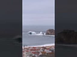 Barrels you can drive a semi through. Nazarè seen from two towns over. Shot by Eliza Alexandra.