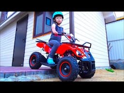 Senya and unpacking an ATV for children