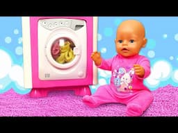 Baby doll's clothes are dirty. Toy laundry with baby dolls. Mermaid costume for baby Annabell doll.