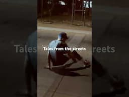 Homeless man breakdancing in traffic