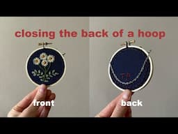 my method for finishing an embroidered hoop: sewing the backing & adding a chain