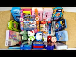 Box full of fancy stationery, toys & gadgets - pencil sharpner, erasers, school supplies, pencil box