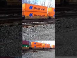 Kansas City Southern engine pulls giant double stack train.