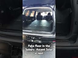 Fake floor to mount charge controller....inventer....battery. 200 watt panels on top of the Subaru.