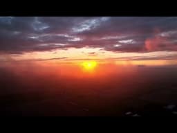 Drone flies through mist to film dramatic sunset