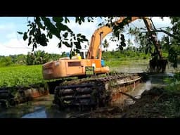 AMFIBIA EXCAVATOR HITACHI EX200 KOREK RUMPUT SANGAT TEBAL DALAM SYUNGAI