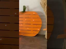 DIY Light-up Wooden Pumpkin Using yardsticks #diyfalldecor #falldecor