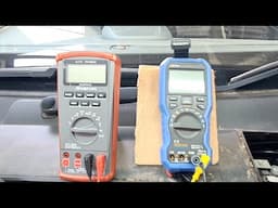 Using a multimeter (DMM) to measure current or battery drains.