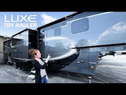 Beautiful Luxe Toy Hauler with Custom Bunks in the Garage