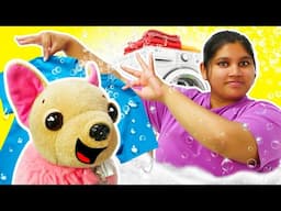 Baby doll washes dirty clothes in a toy washing machine. Baby Emily ruins a toy pyramid. Kids videos