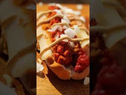 Jeremy's Pastrami Chili Dog is a game-changer, taking hot dogs to a whole new level!