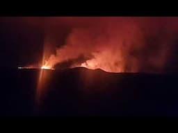 Lava still moving westwards. Two craters visible now.