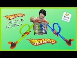 HOT WHEELS Kid Playing Hot Wheels Rebound Raceway