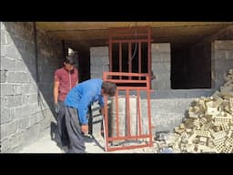 "Making Dreams: Akbar and Rashid's Masterful Installation of Jamila's Dream House Door and Window"