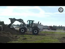 Hidromek HMK635 wheel loader and 310 LC excavator