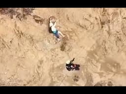 CAUGHT ON CAMERA: Person clings to cliff during dramatic rescue