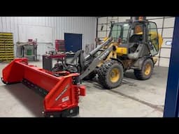 Watch as we install an HLA snow wing plow on a Volvo Loader!