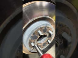 You don’t have to beat the crap out of Nissan / Infinity rotors to remove them.