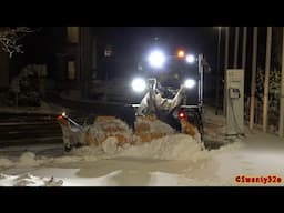 4K| Caterpillar 906M Plowing Snow In A Parking Lot