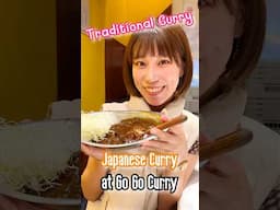 A Japanese girl shares Japanese style Curry Rice at Go Go Kare- in Akihabara