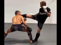 TJ Dillashaw Head Kicks Partner In Spar