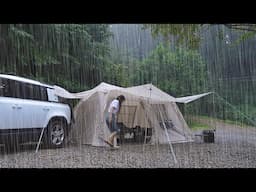 Solo camping in torn and broken tent in pouring heavy rain ASMR